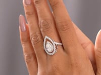 Model wearing pear double-halo lab-grown diamond ring video