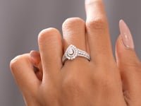 Model wearing pear double-halo lab-grown diamond ring video