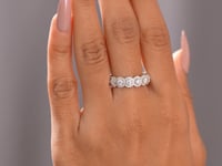 Model wearing round square-halo lab-grown diamond ring video
