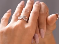 Model wearing infinity loop lab-grown diamond ring video