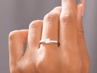 Model video wearing twisted band bar-set diamond ring