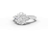2.17 Ct Oval Three-Stone Pavé Diamond Engagement Ring