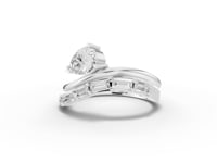 1.51 Ct Pear Solitaire With Baguettes Bypass Ring