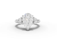 3.82 Ct Pear Three-Stone Lab Grown Diamond With Side Stone Ring