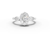 1.20 Ct Oval Bezel Three Stone Lab Grown Diamond Ring