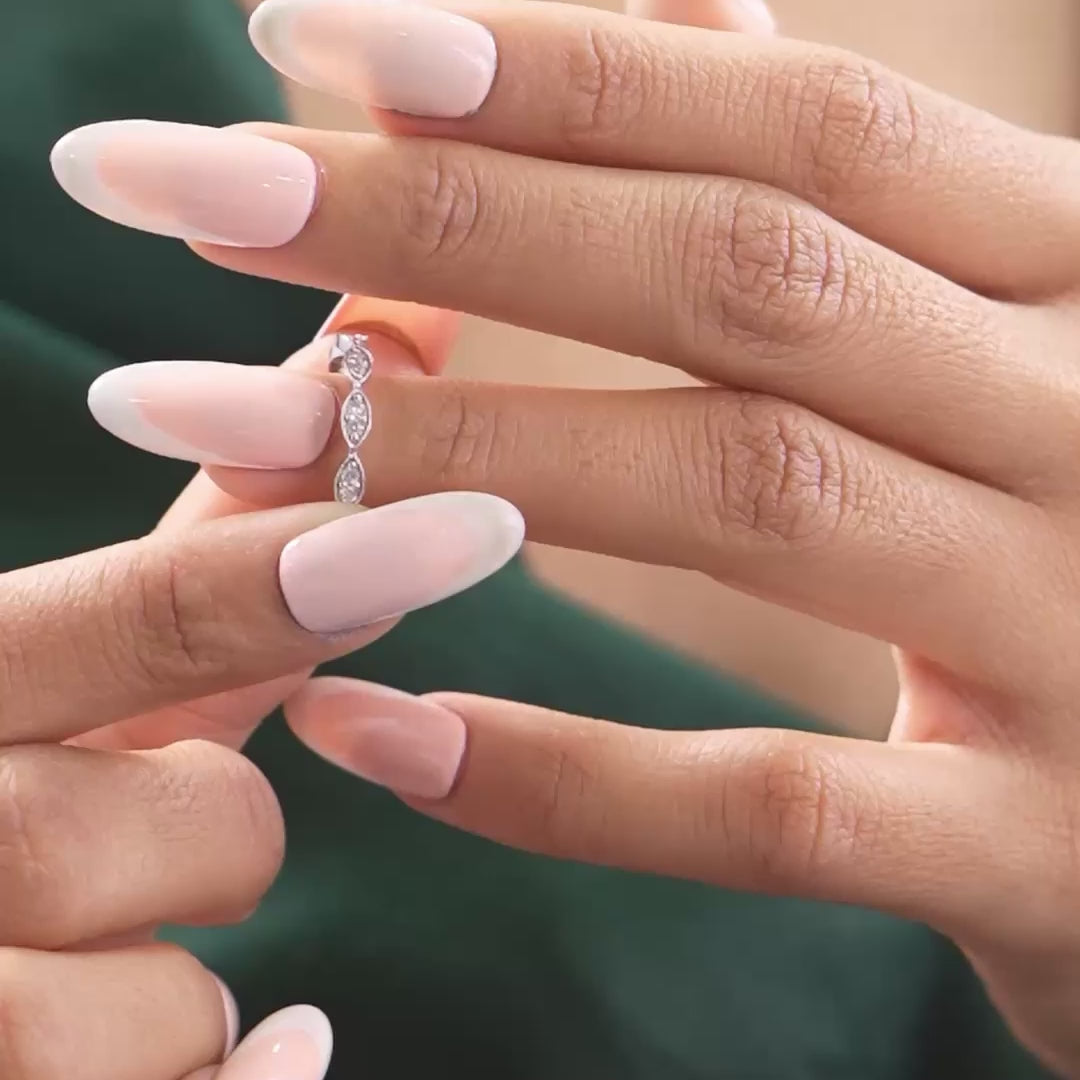 Model wearing 1.22 CT oval lab-grown bezel solitaire ring video clip