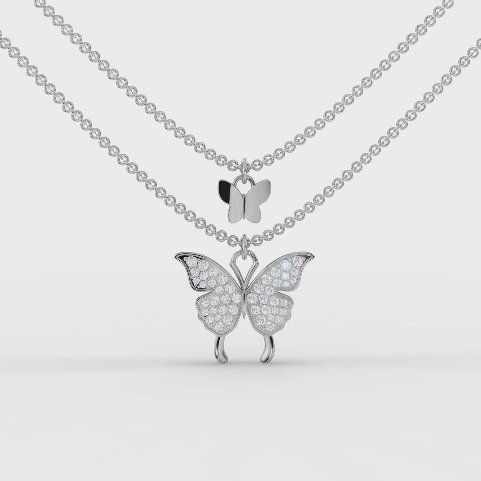 360° rotation video of double butterfly pendant