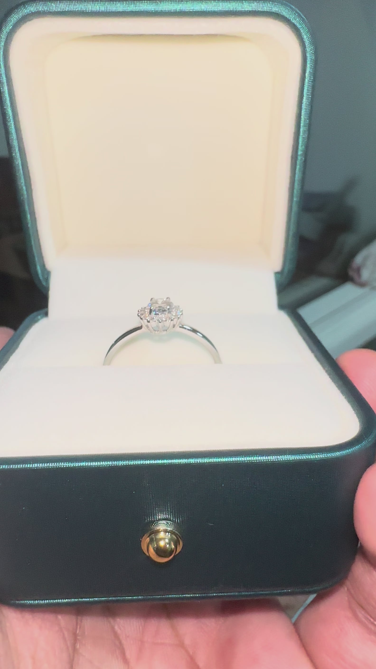 Oval lab-grown diamond halo ring top alignment video in a box