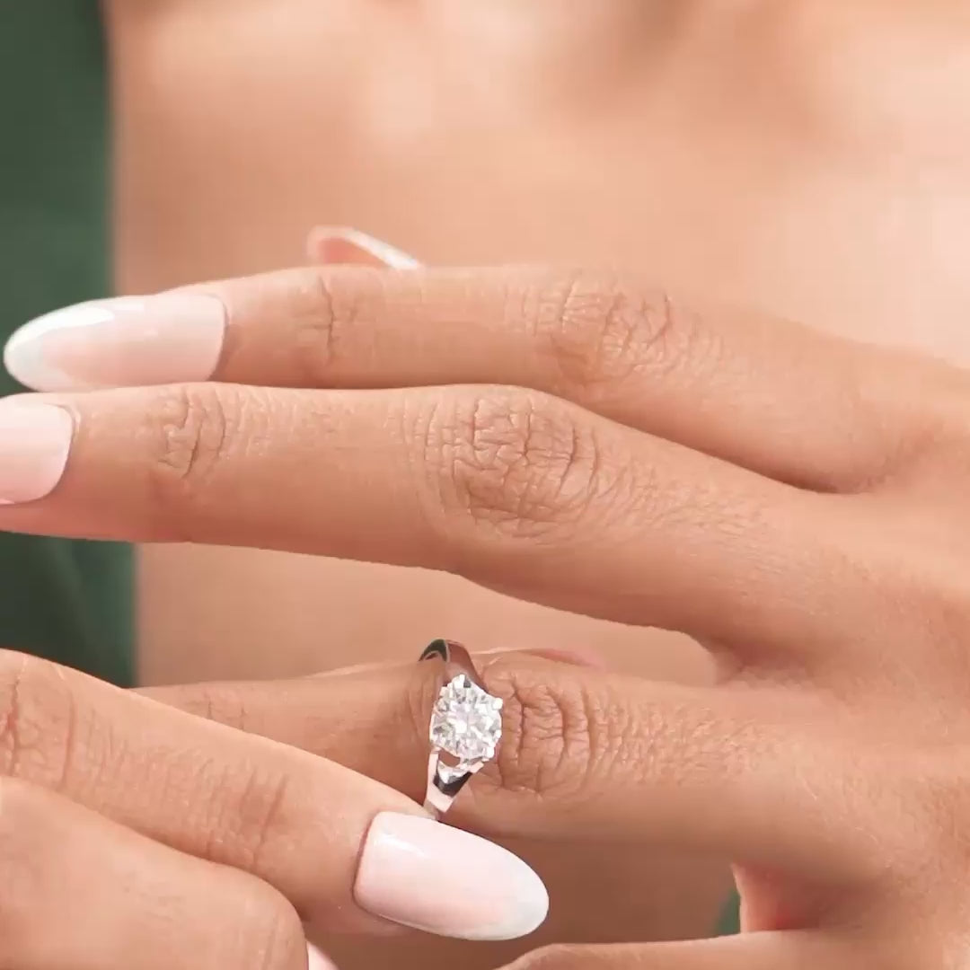 Ring in motion showing brilliance performance on model's hand