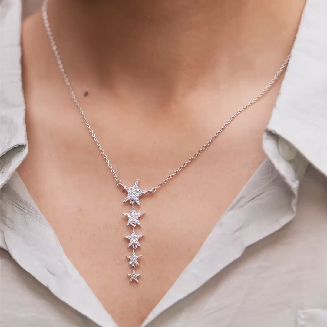 Pendant in motion demonstrating brilliance on model