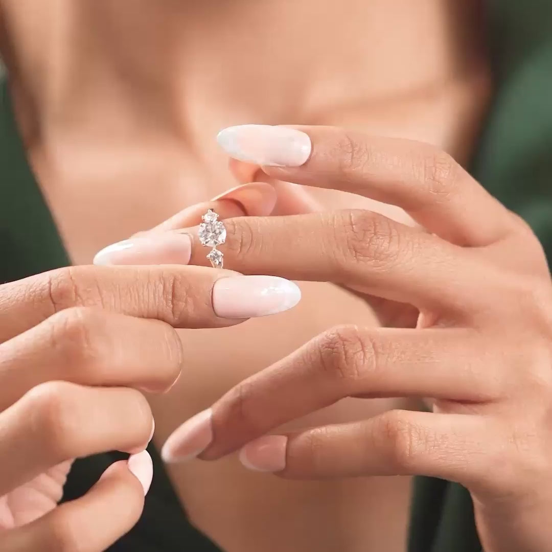 Ring in motion showing accented sparkle on model's hand