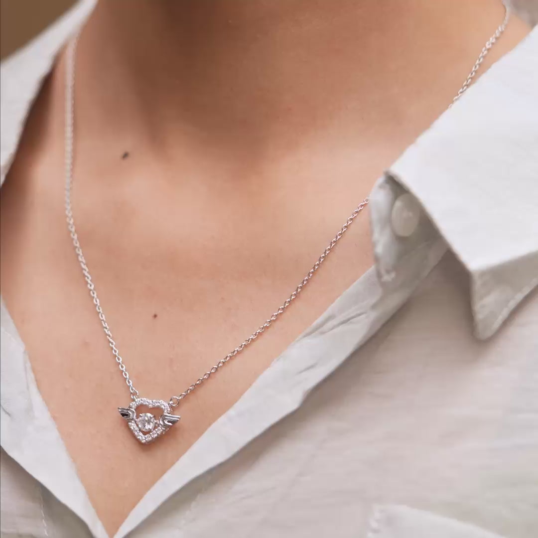 Pendant movement showcasing halo brilliance on model