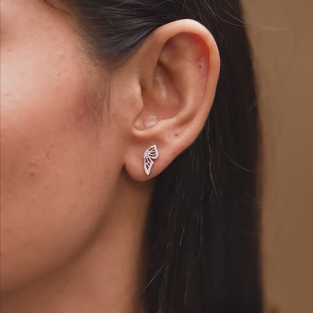 Close-up of earrings on ear