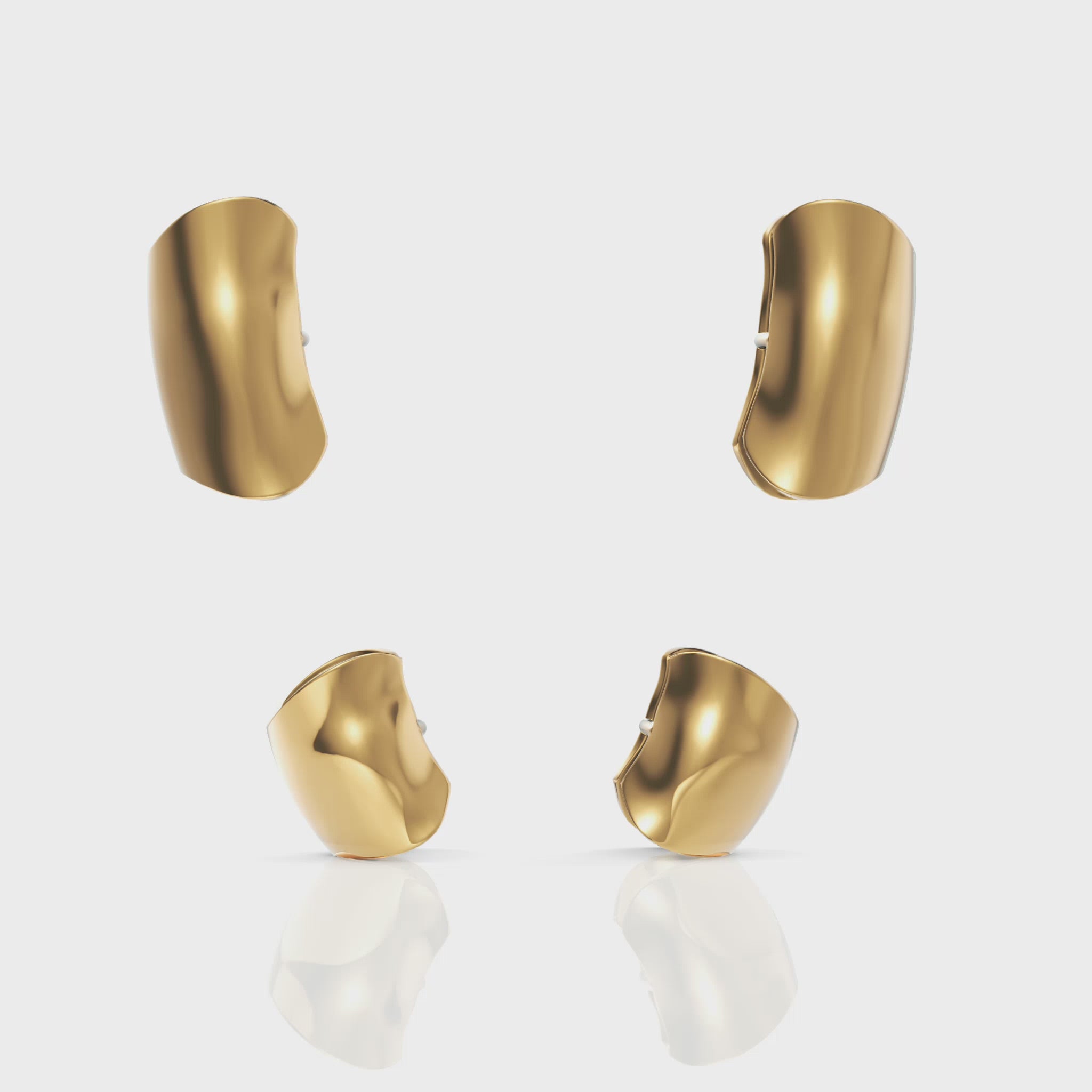 360° rotation video of sculptural cuff earrings