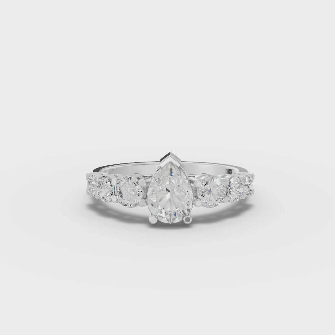 Pear-Shaped Lab-Grown Diamond Ring with Round Side Stones