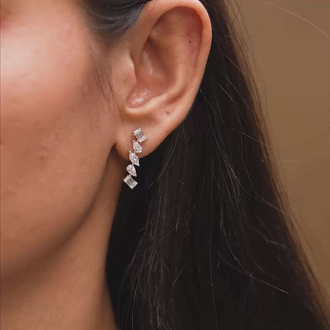 Earrings in motion demonstrating light performance