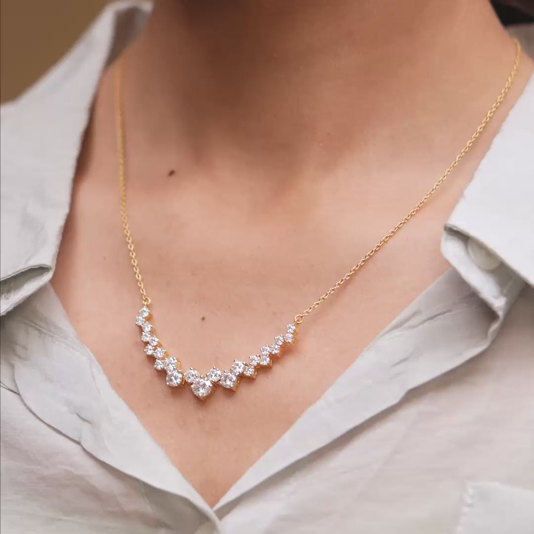 Necklace in motion showcasing cascading brilliance on model