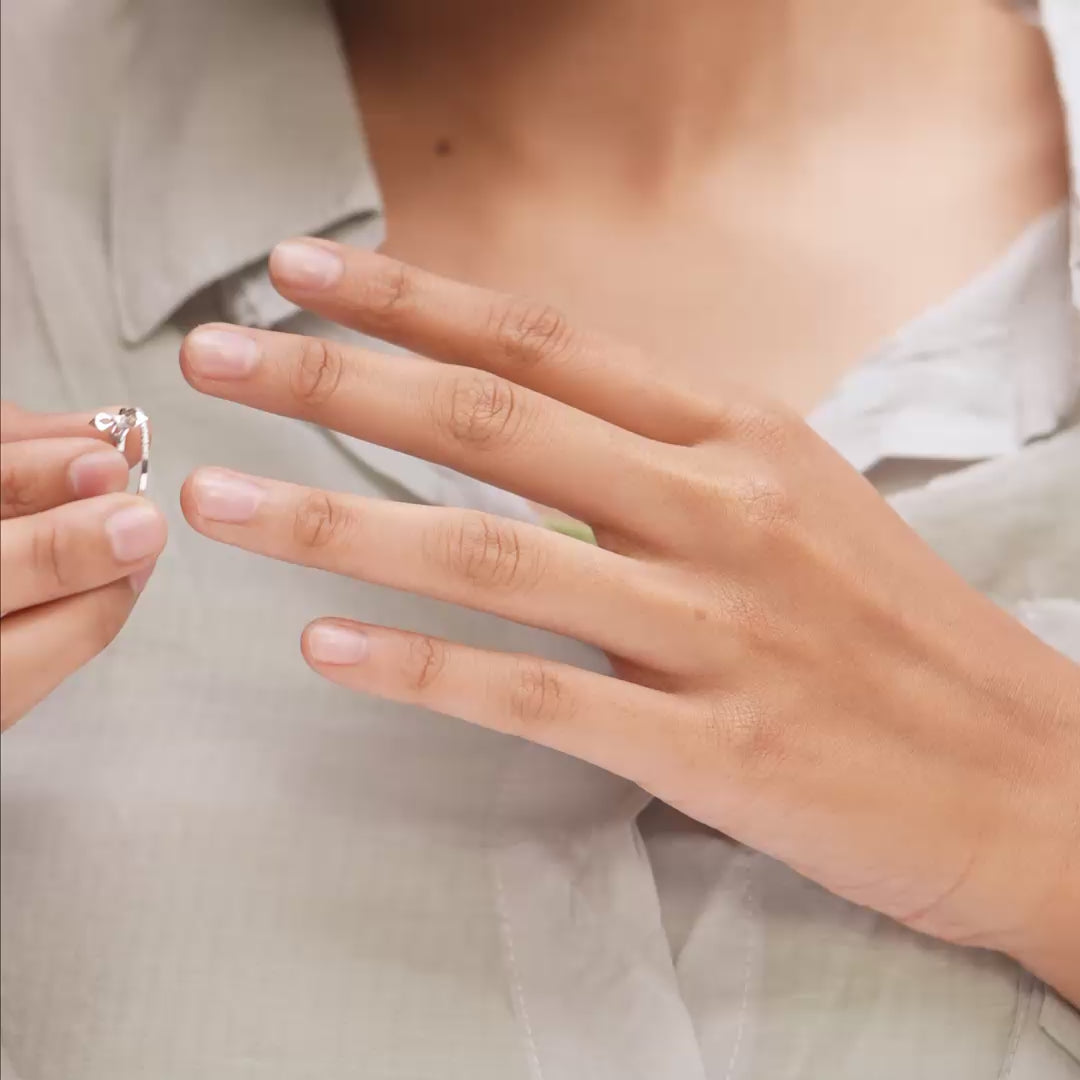Model wearing 0.04 CT daisy dew lab-grown diamond ring video clip