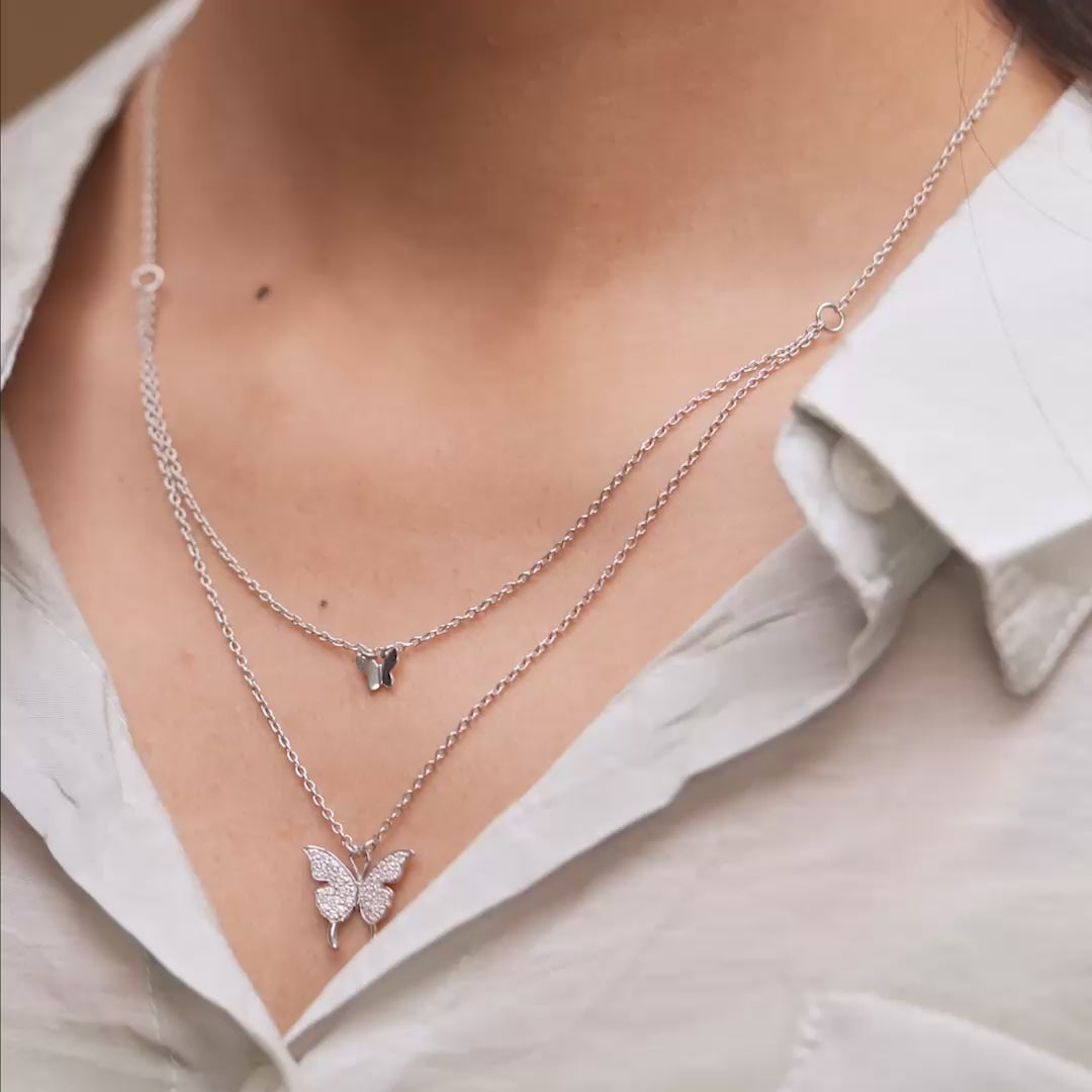 Pendant in motion showing layered brilliance on model