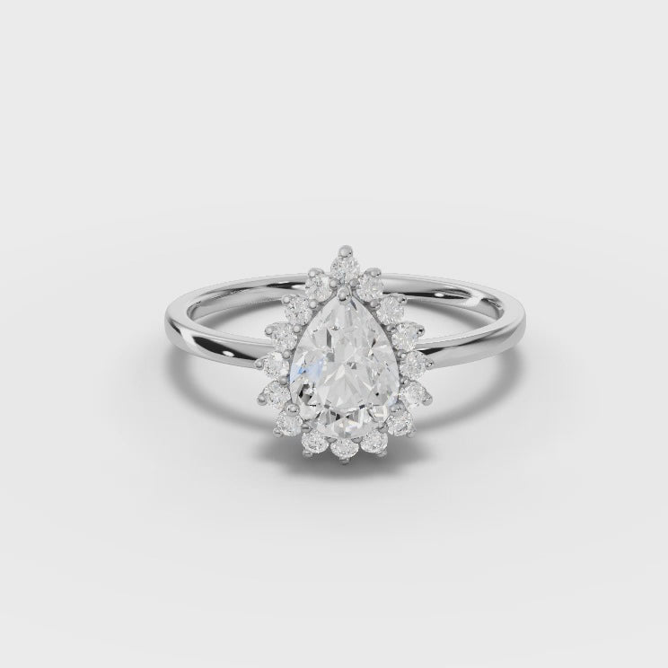 360° rotation video of pear halo engagement ring