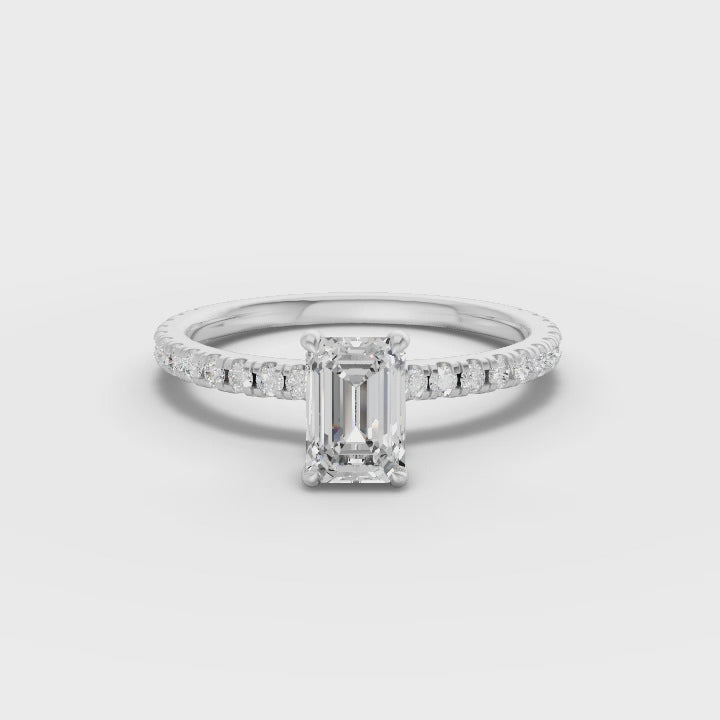 360° rotation video of emerald pavé ring