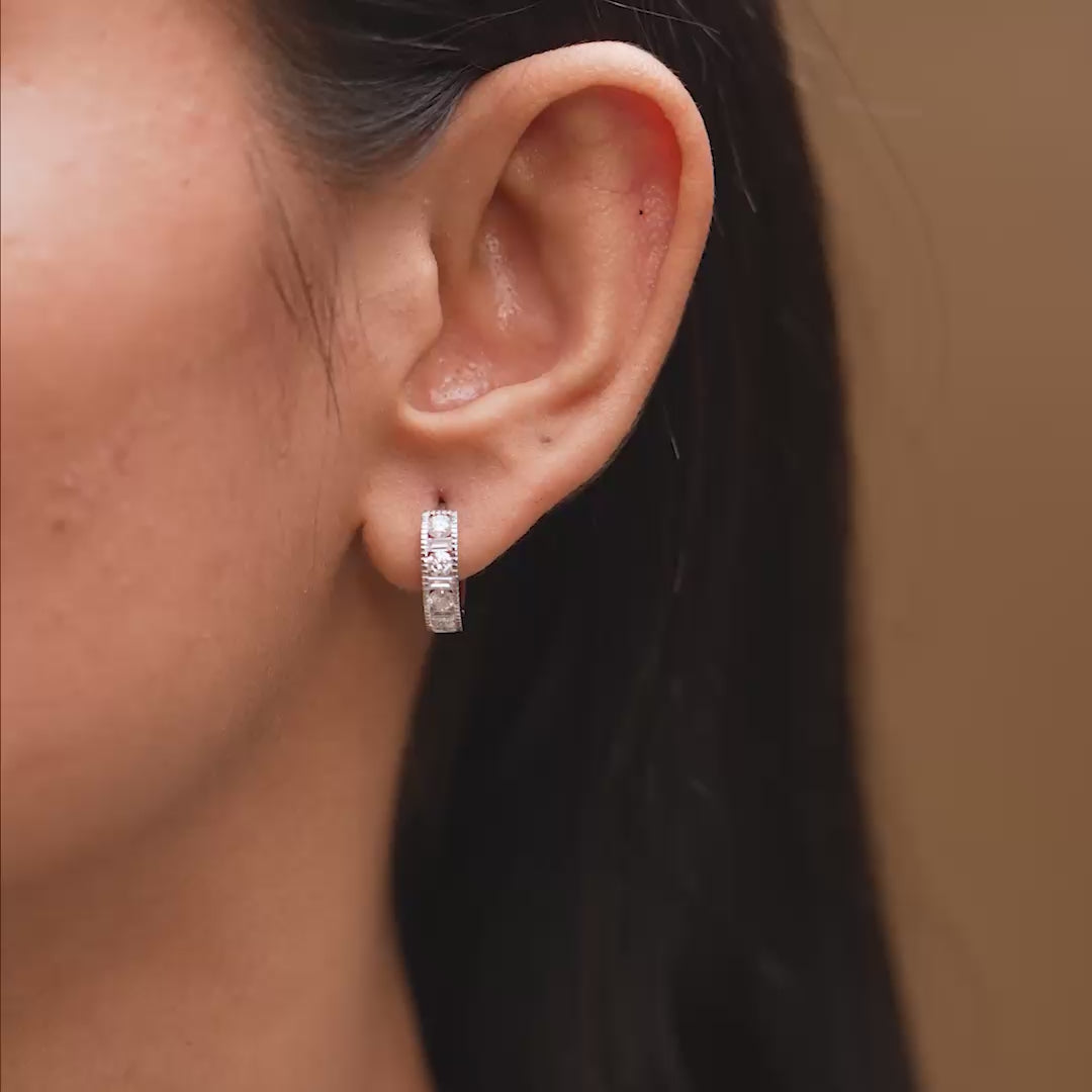 Model wearing 1.19 CT lab-grown diamond channel set huggie earrings video clip