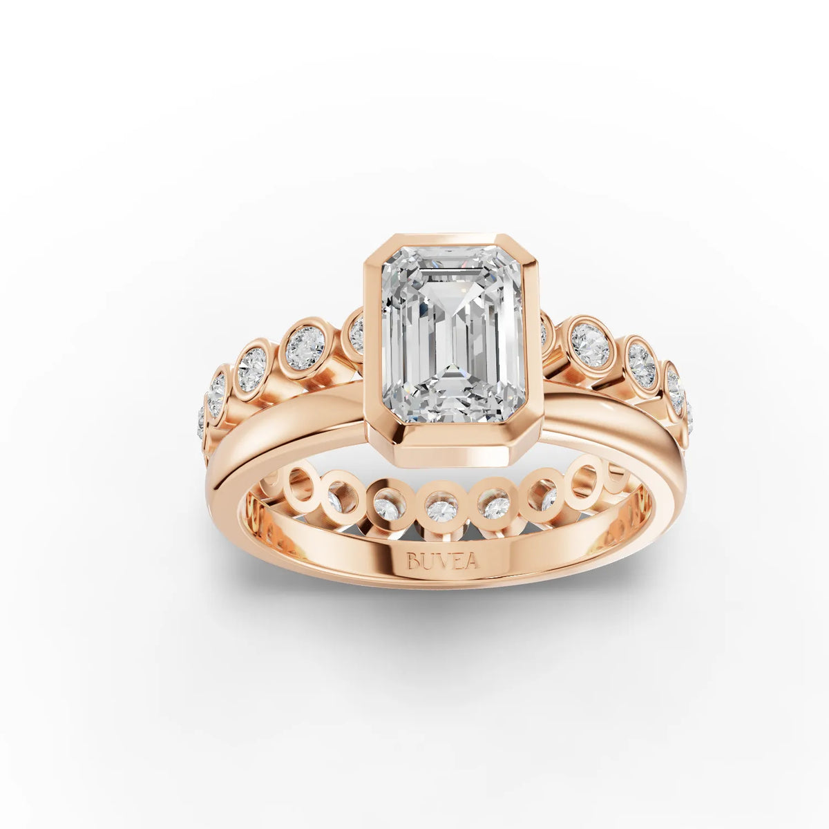 Emerald-Cut Engagement Ring with Bezel Setting and Round Diamond Accents