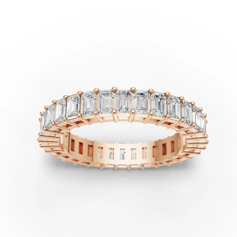 Emerald eternity band rose gold angle