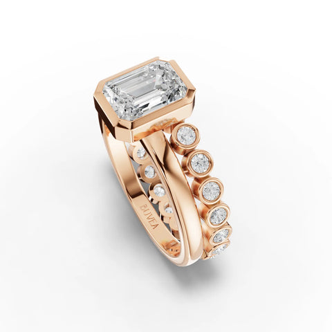 Emerald-Cut Engagement Ring with Bezel Setting and Round Diamond Accents