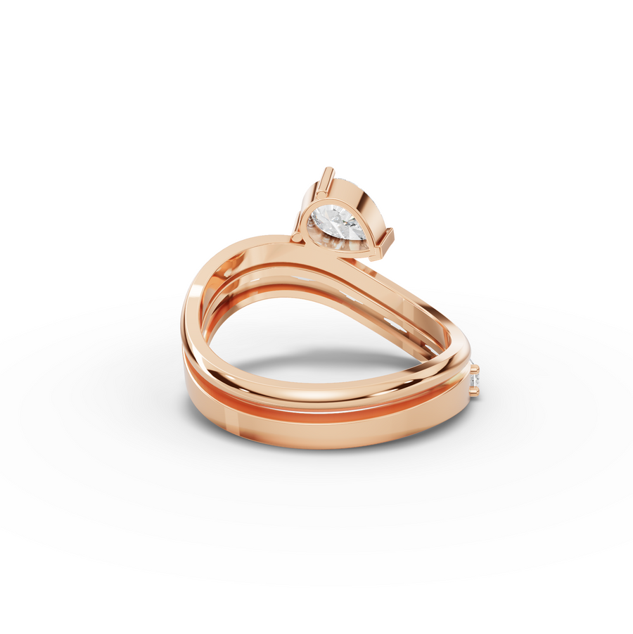 1.51 Ct Pear Solitaire With Baguettes Bypass Ring