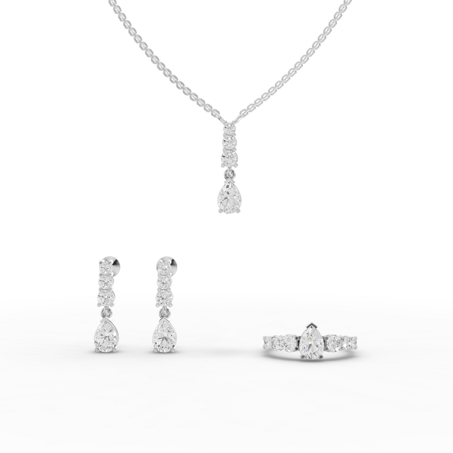 4.39 Ct pear lab grown diamond jewellery set with drop pendant, pear ring and matching round accent earrings