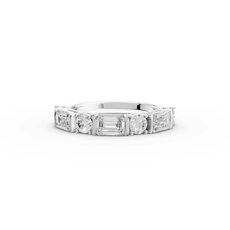 1.57 ct half eternity ring with alternating lab grown round diamonds and emeralds