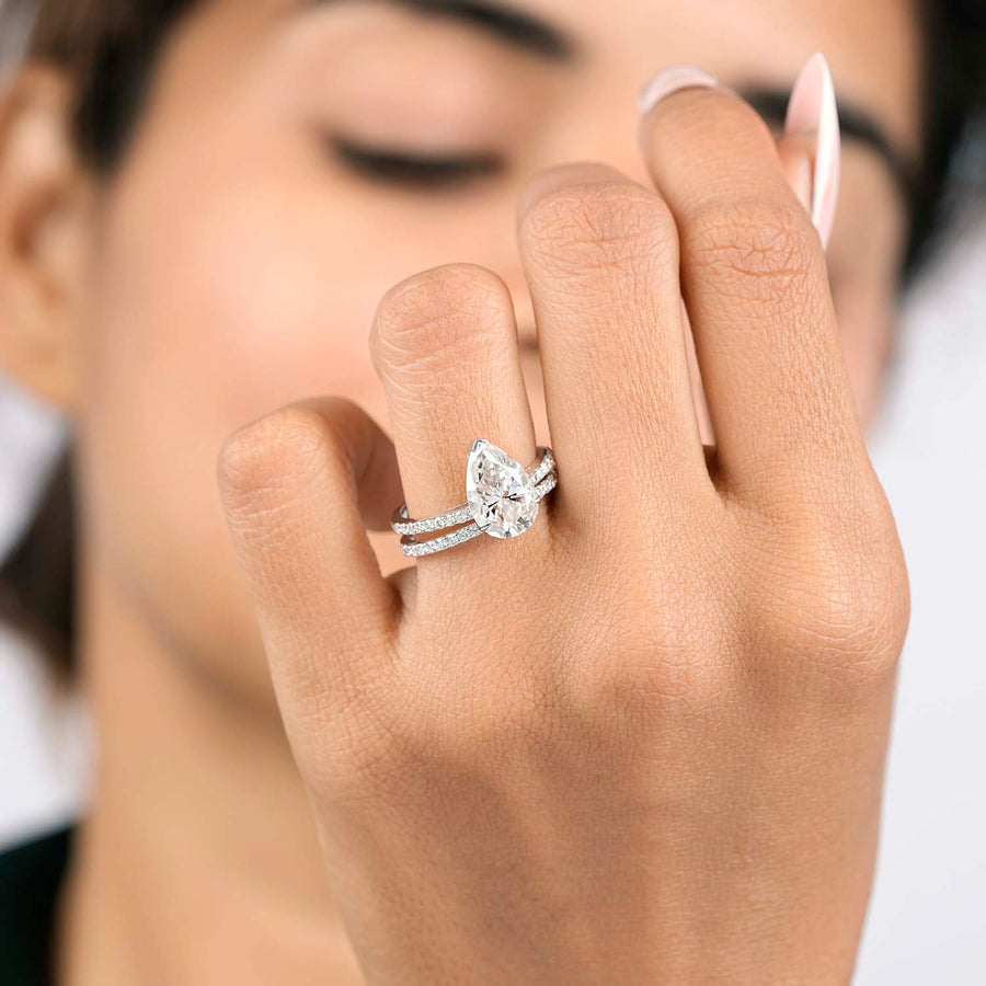 3.44 CT pear lab-grown diamond pavé ring worn on hand