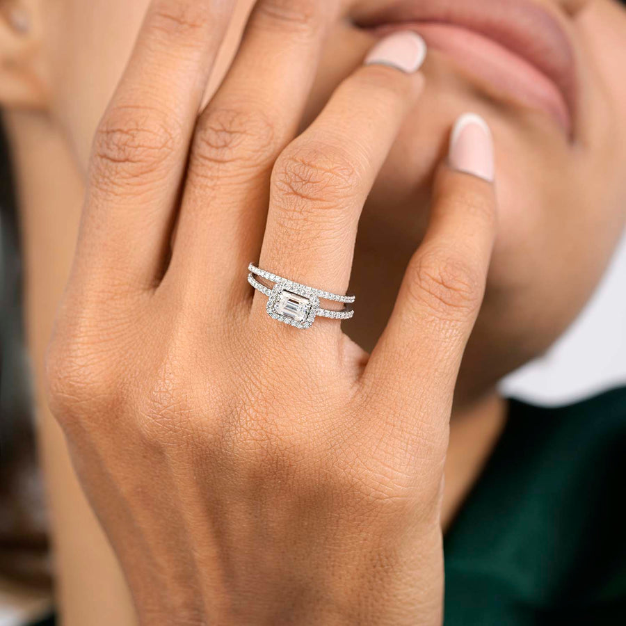 0.72 CT emerald lab-grown diamond halo ring worn on hand