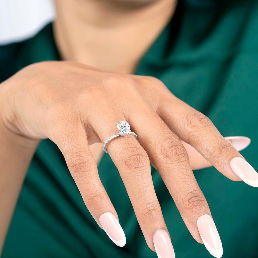 Lab-grown pear ring hand close-up