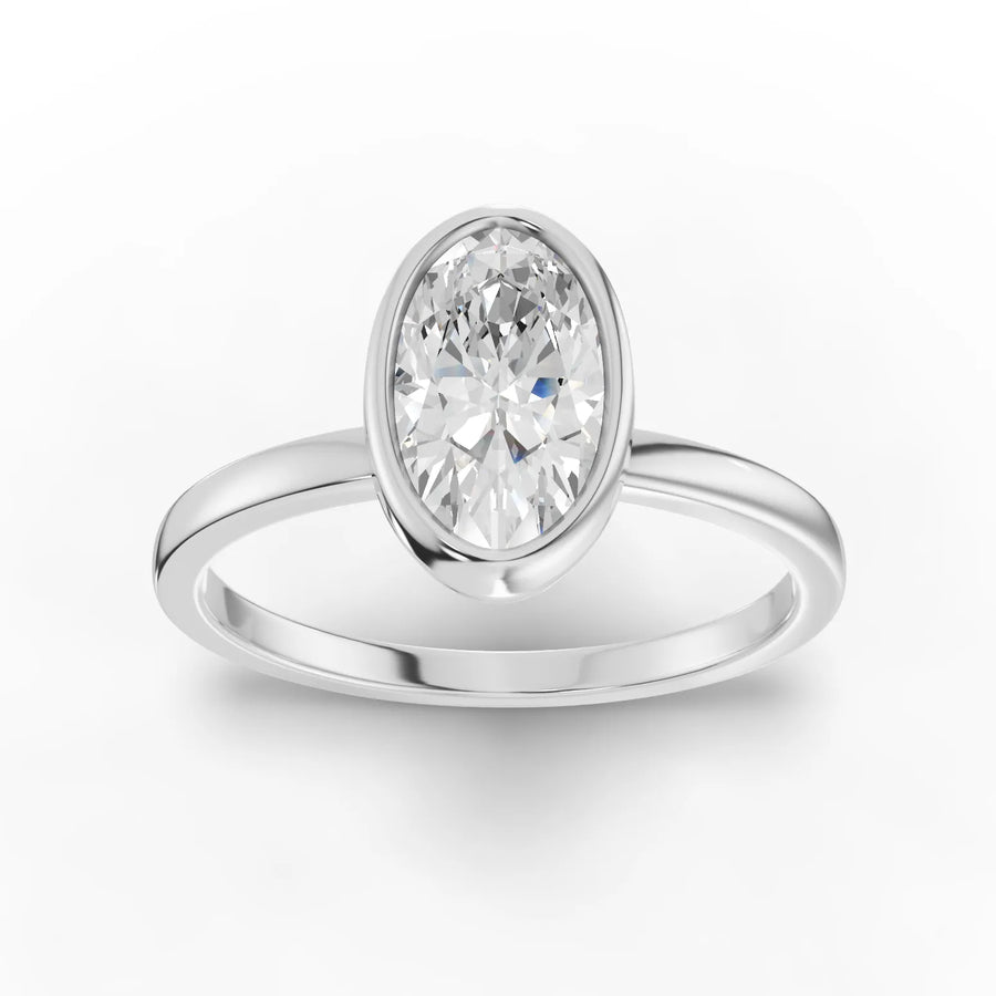 1 ct oval bezel solitaire lab diamond ring with polished band and modern low-profile setting