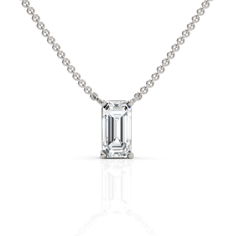 4 ct emerald cut lab grown diamond solitaire pendant necklace in gold with a single elongated center stone