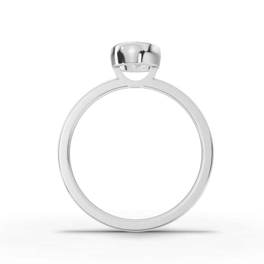 Lab-grown oval bezel ring white gold close-up