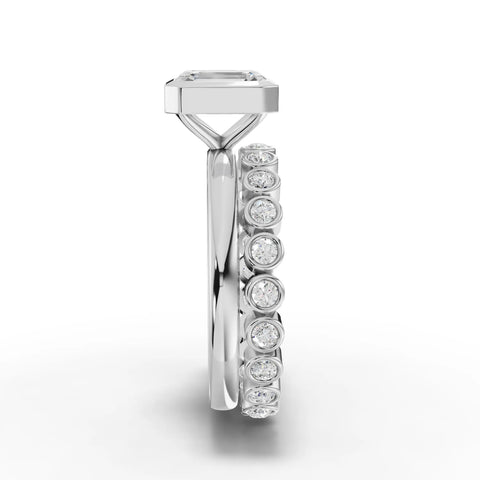 Emerald-Cut Engagement Ring with Bezel Setting and Round Diamond Accents