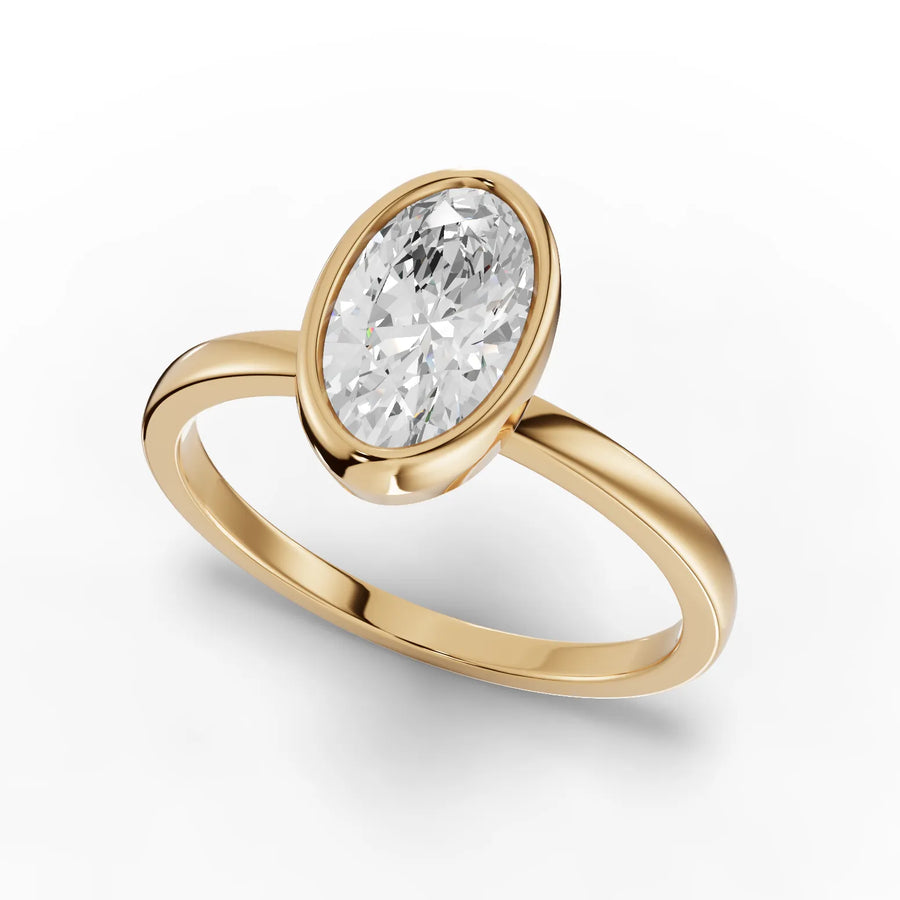 Bezel solitaire ring yellow gold angle