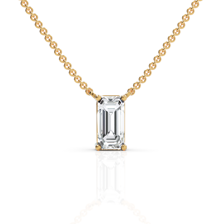 Lab-grown emerald cut diamond pendant yellow gold close-up