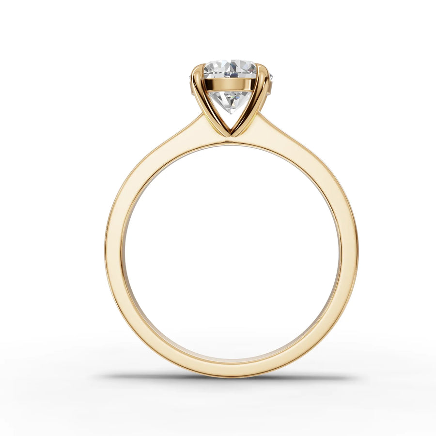 Lab-grown round solitaire ring yellow gold close-up