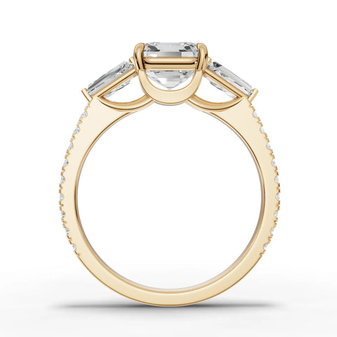 Emerald trinity lab-grown ring yellow gold close-up