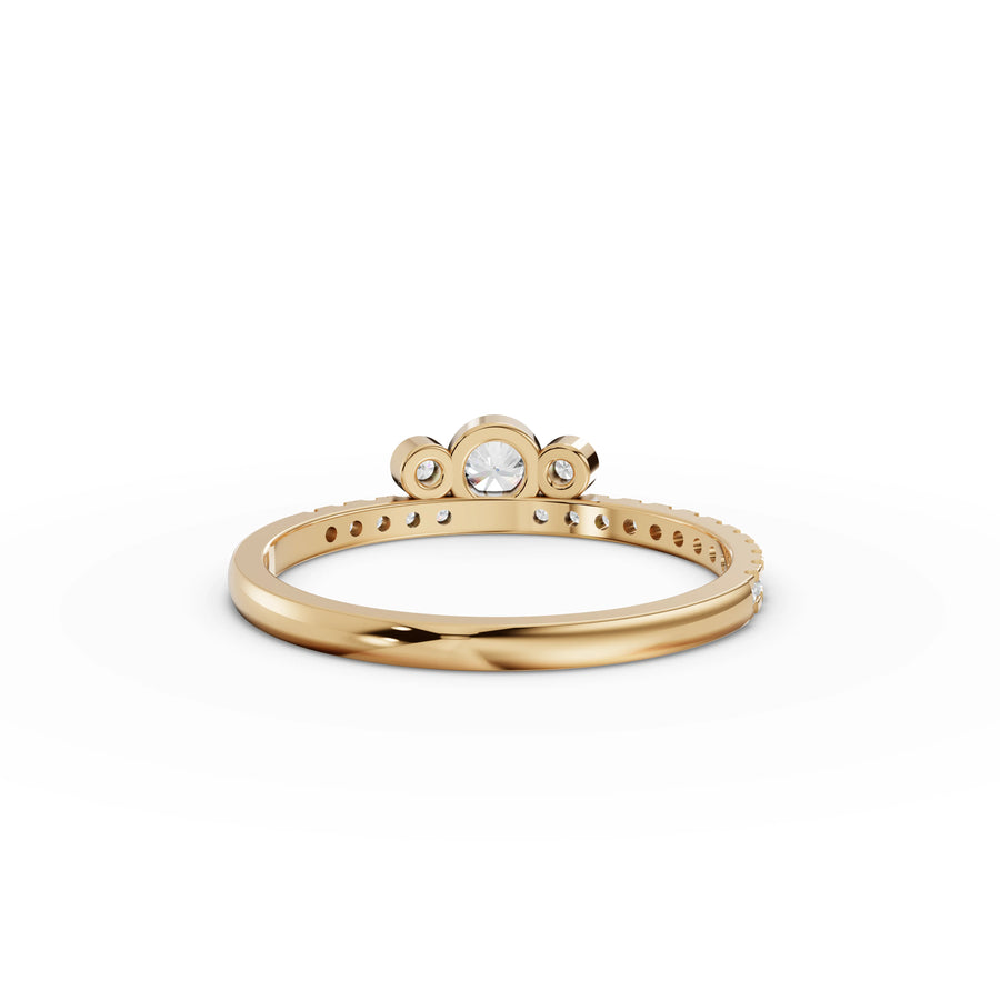 0.29 Ct Round Bezel Three-Stone Ring
