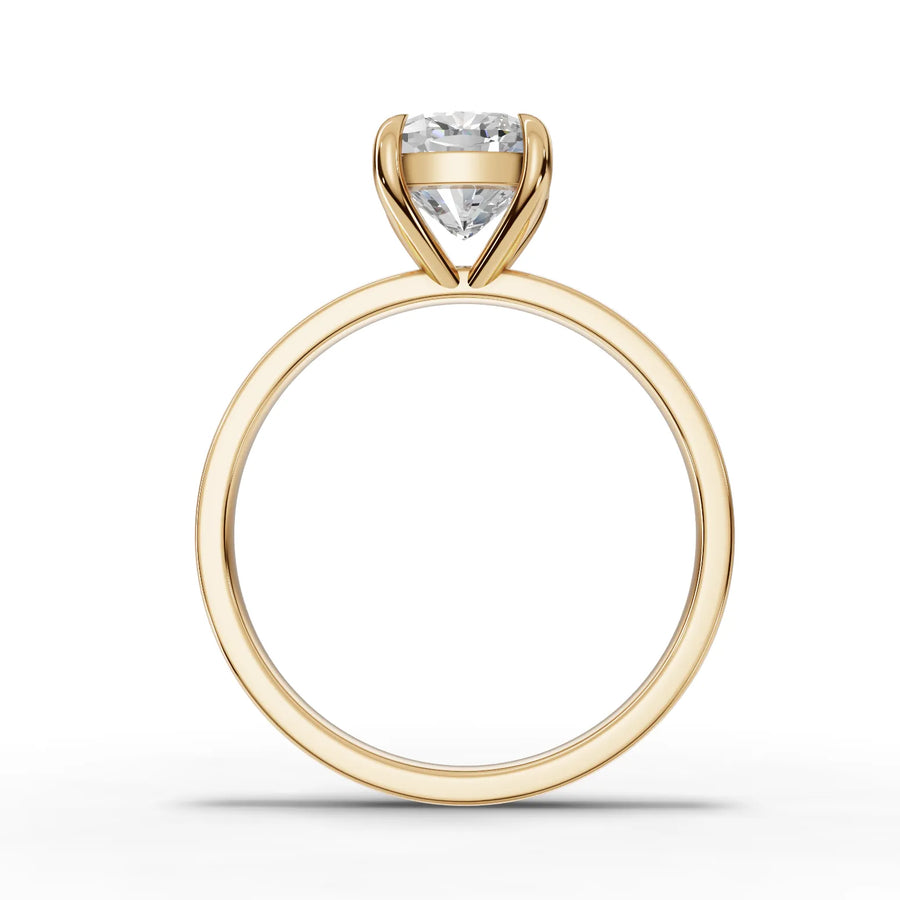 Lab-grown cushion solitaire ring yellow gold close-up