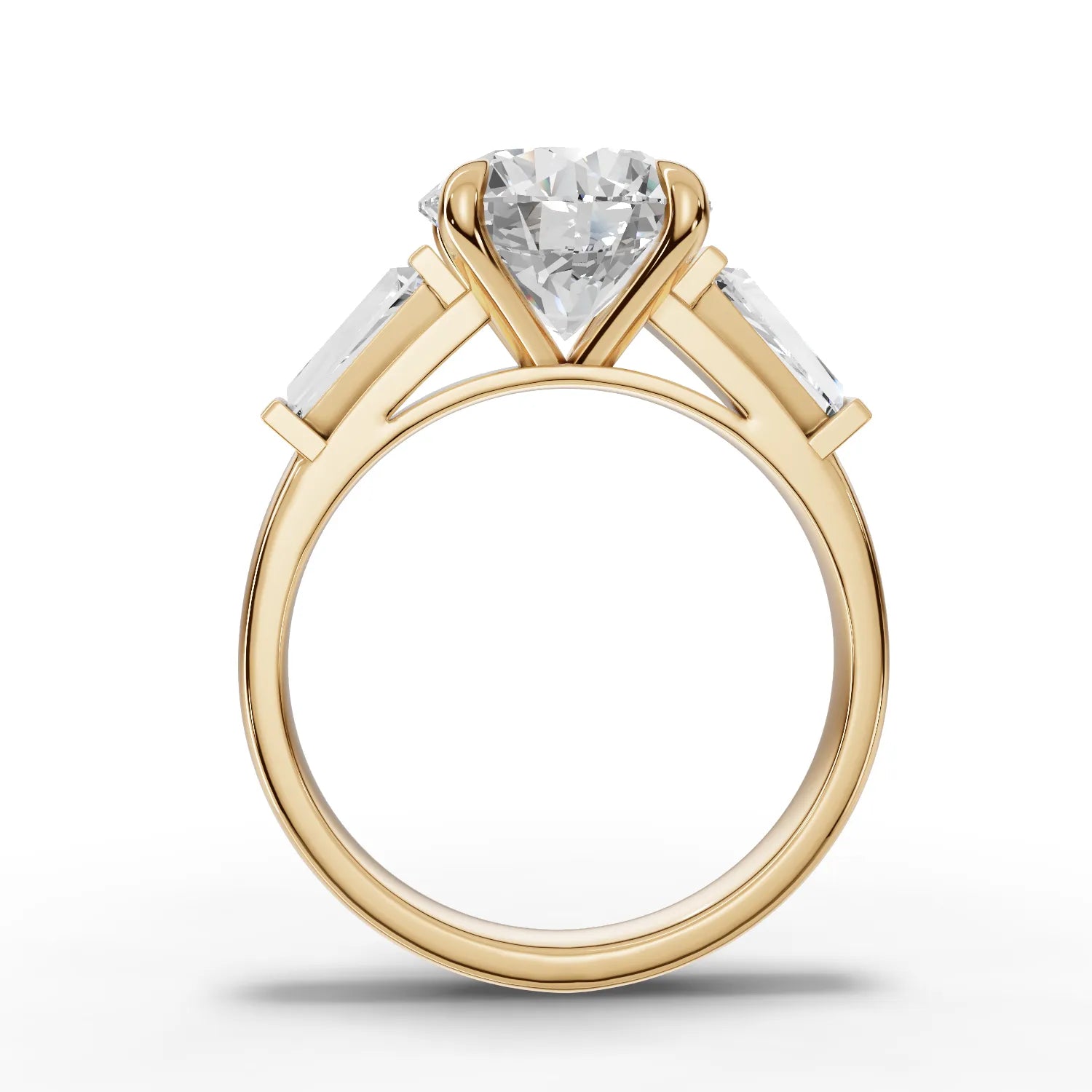 Lab-grown round three stone ring yellow gold close-up