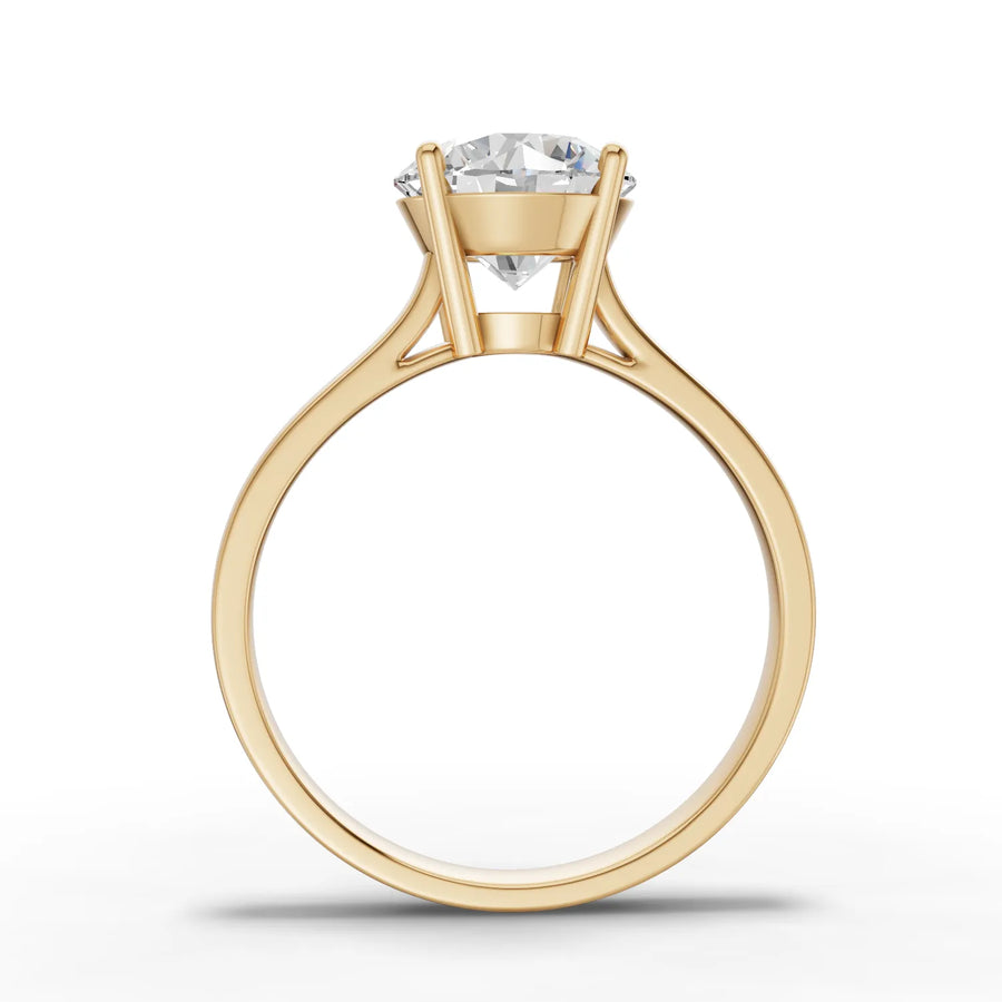 Lab-grown round solitaire ring yellow gold close-up